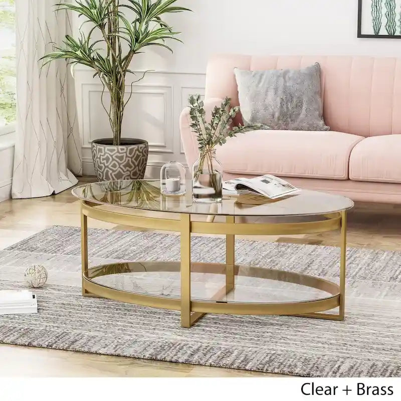 Table basse ovale moderne en verre trempé avec piètement en fer forgé.