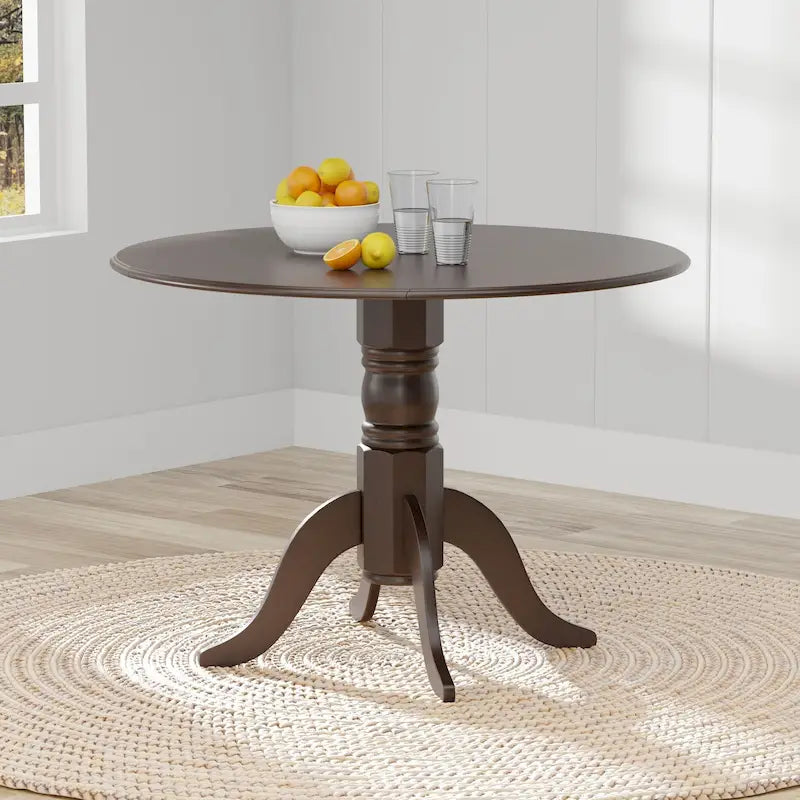Table à manger 42 avec deux rallonges abattantes et pied central en bois