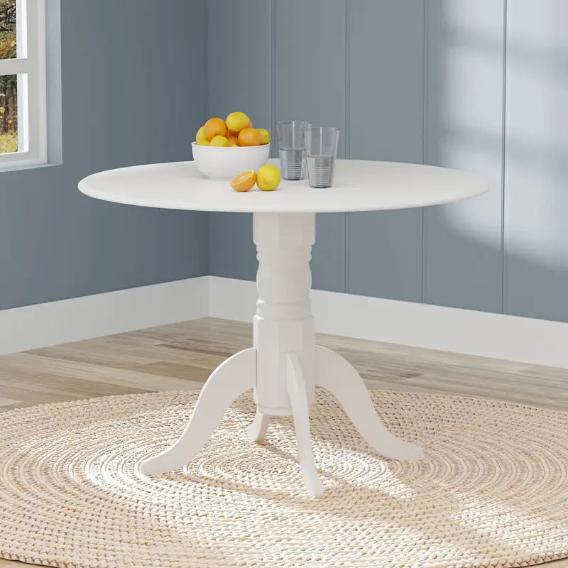 Table à manger 42 avec deux rallonges abattantes et pied central en bois
