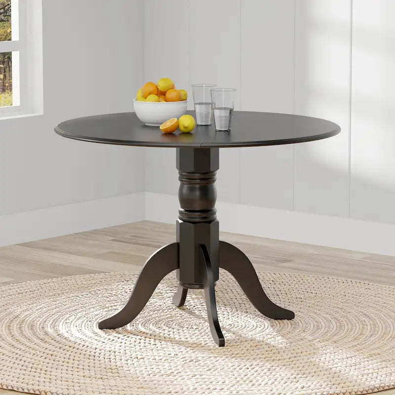 Table à manger 42 avec deux rallonges abattantes et pied central en bois
