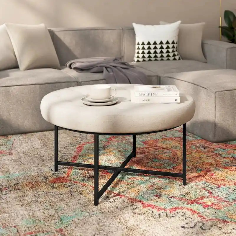 Pouf rond capitonné en coton et lin avec structure en fer