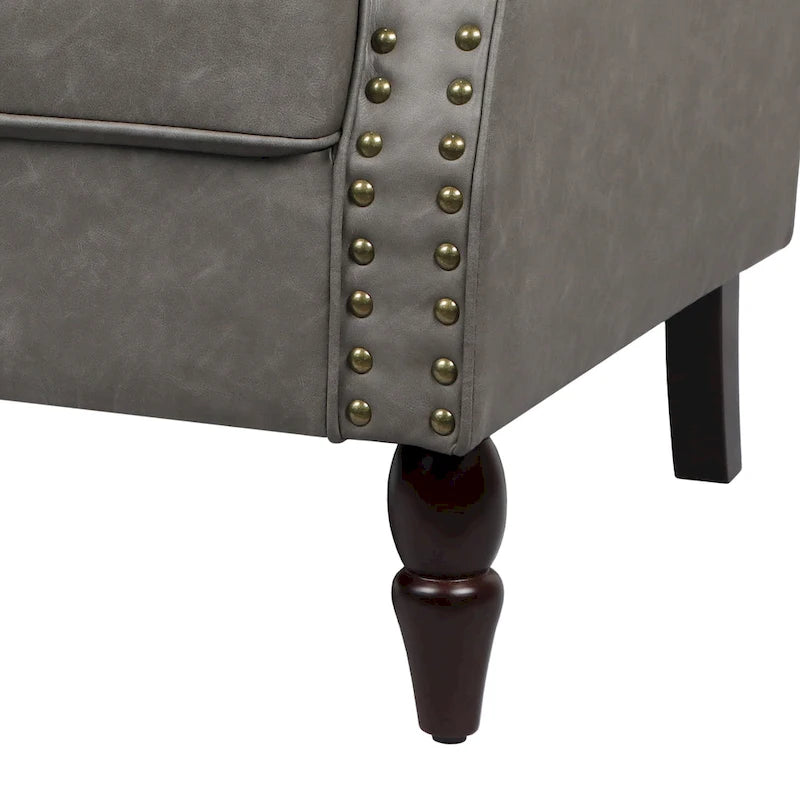 Fauteuil d'appoint en similicuir avec clous décoratifs