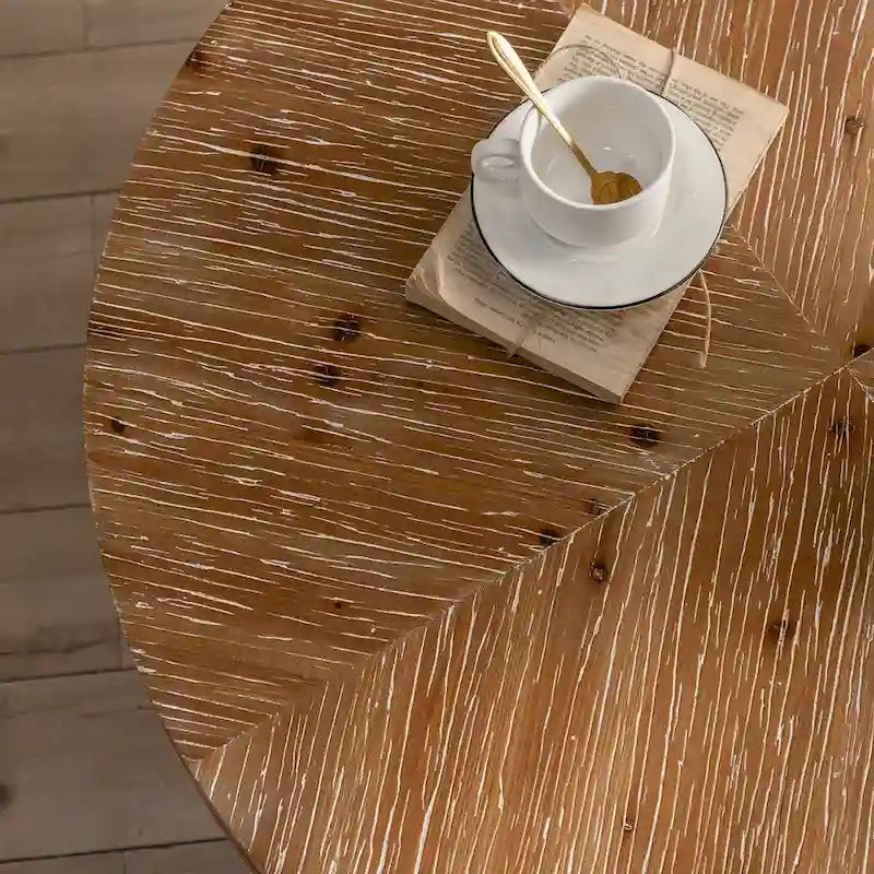 31.29 Table basse ronde, plateau en bois de sapin avec piètement croisé doré